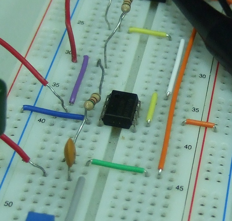 Photo of an op amp circuit featuring an 8-pin dual in-line package (DIP).